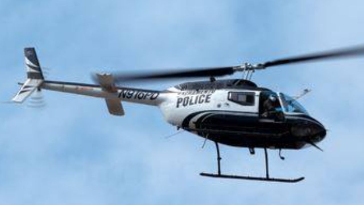 Air One helicopter over Sacramento shooting scene on Wisconsin Avenue